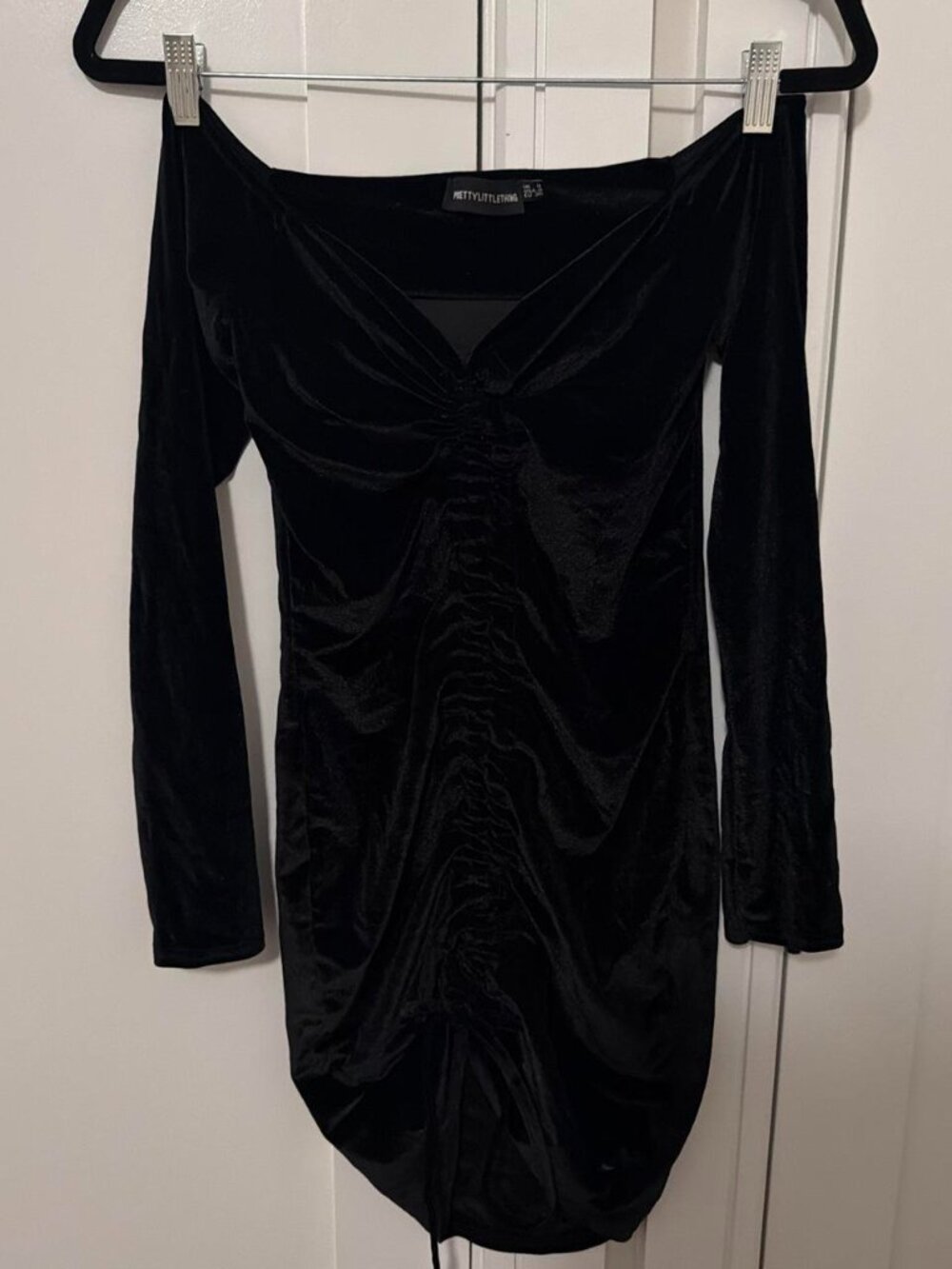 PrettyLittleThing black velvet mini dress with ruched detailing